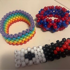 Kandi bracelet lot of 3: Monokuma, flat stitch rainbow, and X base 3D helix